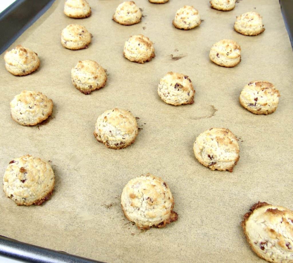 baked snowball cookies on cookie sheet