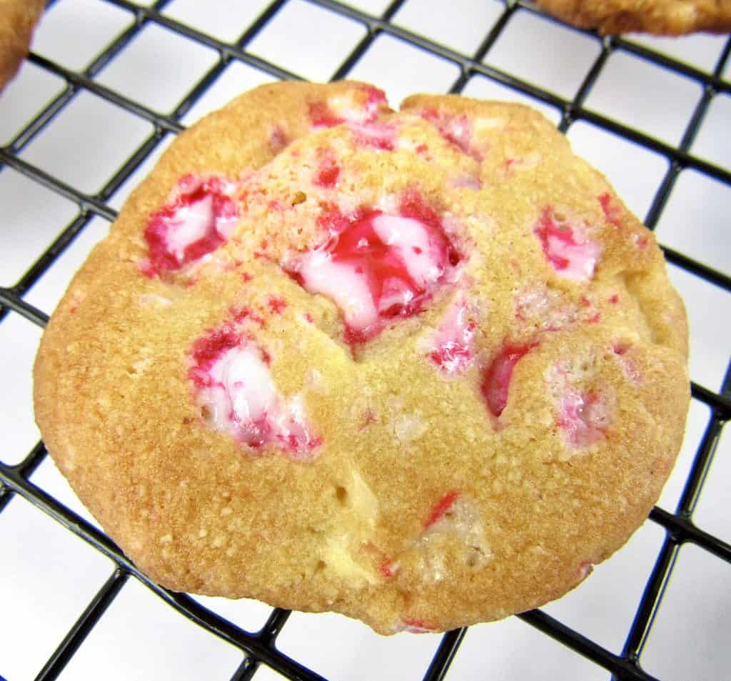 closeup of white chocolate peppermint cookies on baking rack