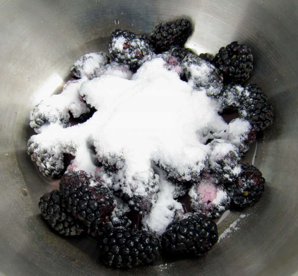 blackberries in pan with sugar