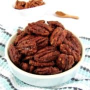 candied pecans in blue bowl