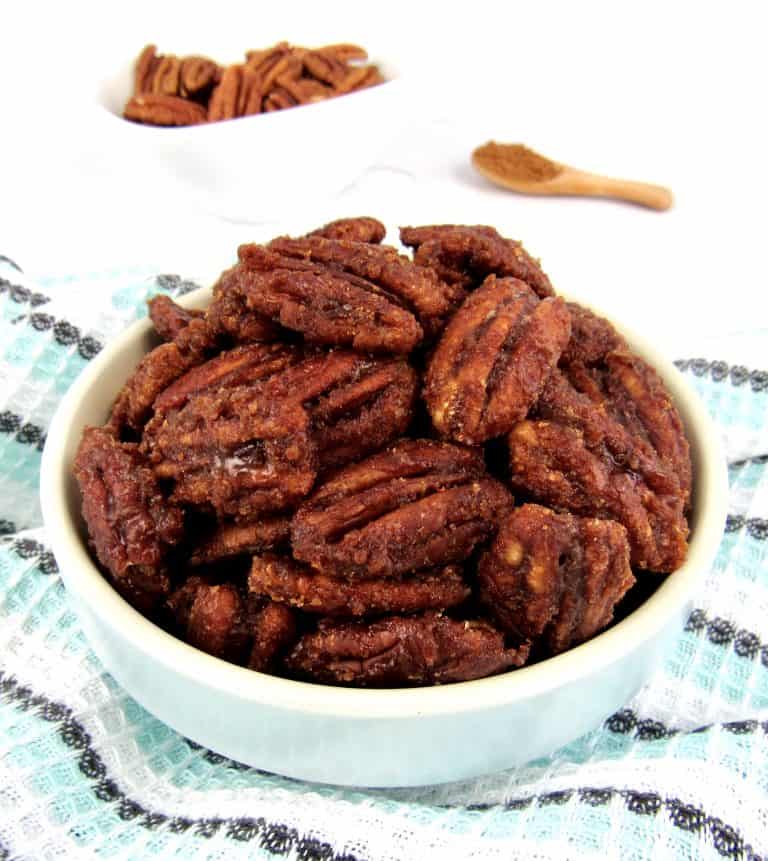 candied pecans in blue bowl