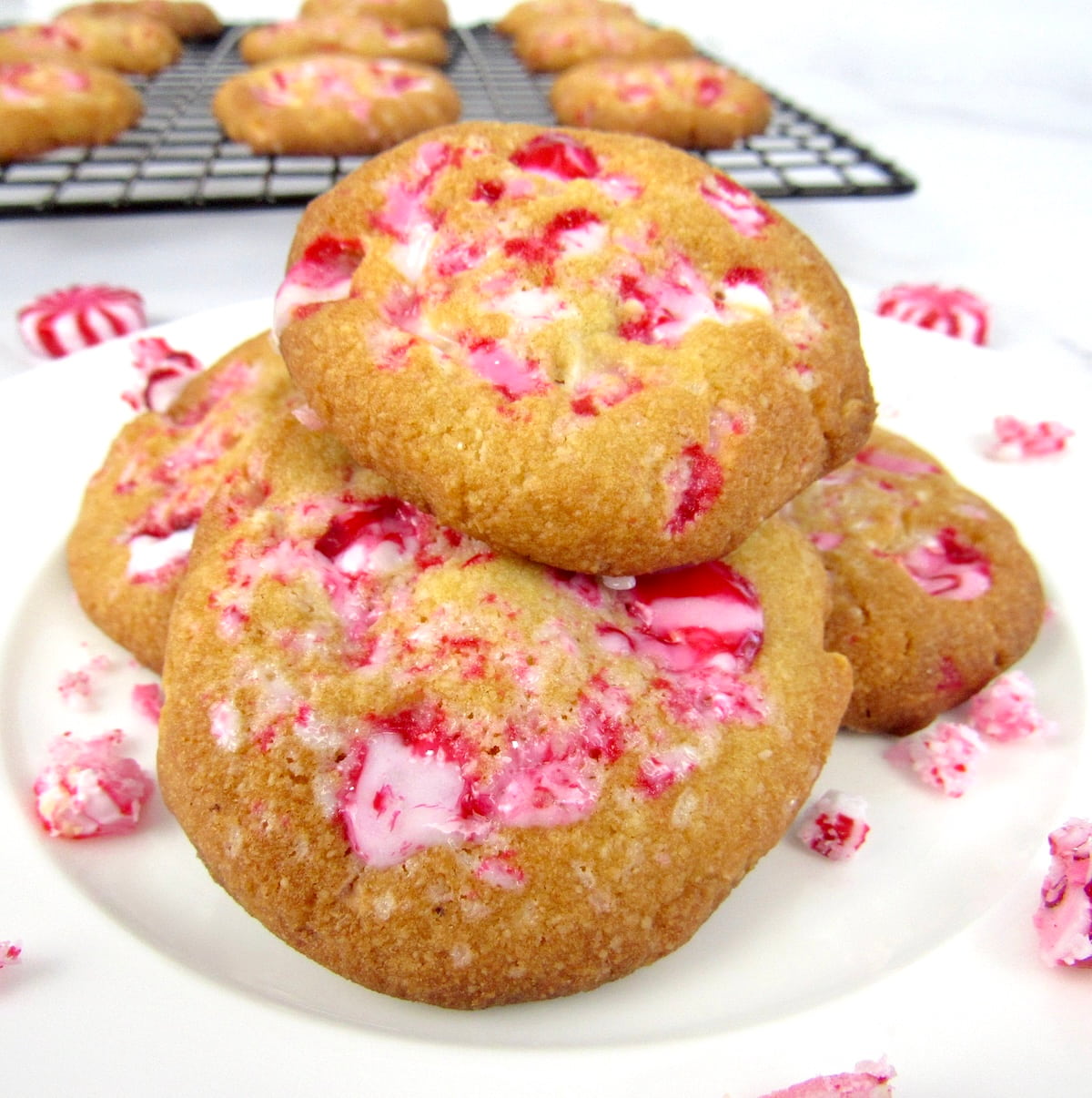 closeup of Keto White Chocolate Peppermint Cookies on white plate