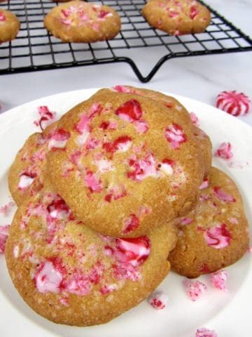 white chocolate peppermint cookies stacked up on plate