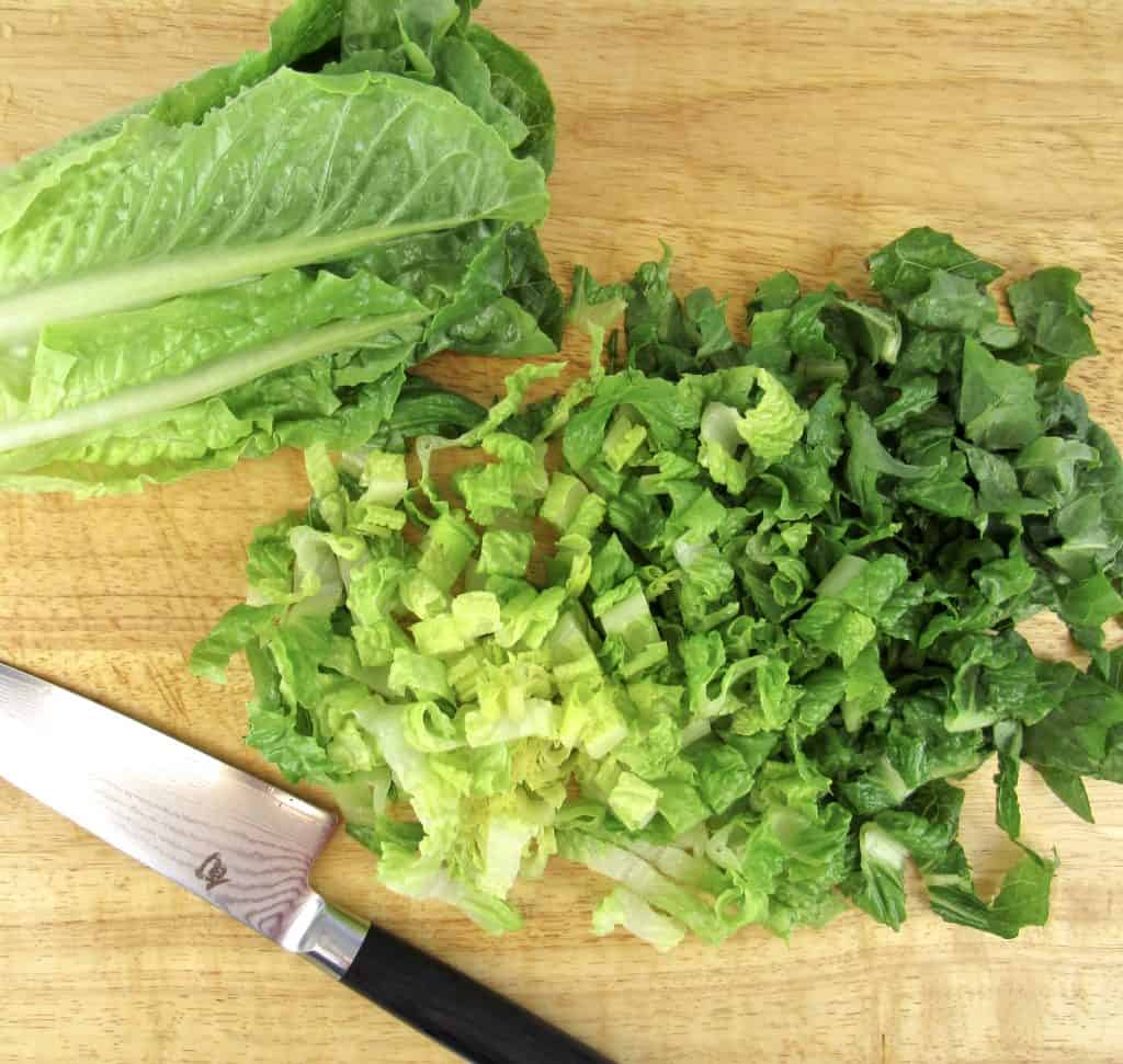 romaine lettuce chopped on cutting board