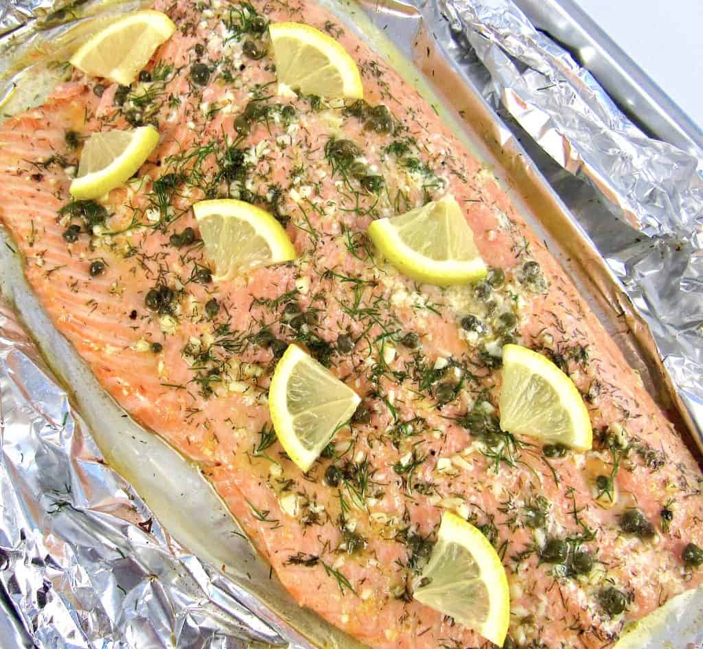 Baked Salmon in Foil with slices of lemon on top