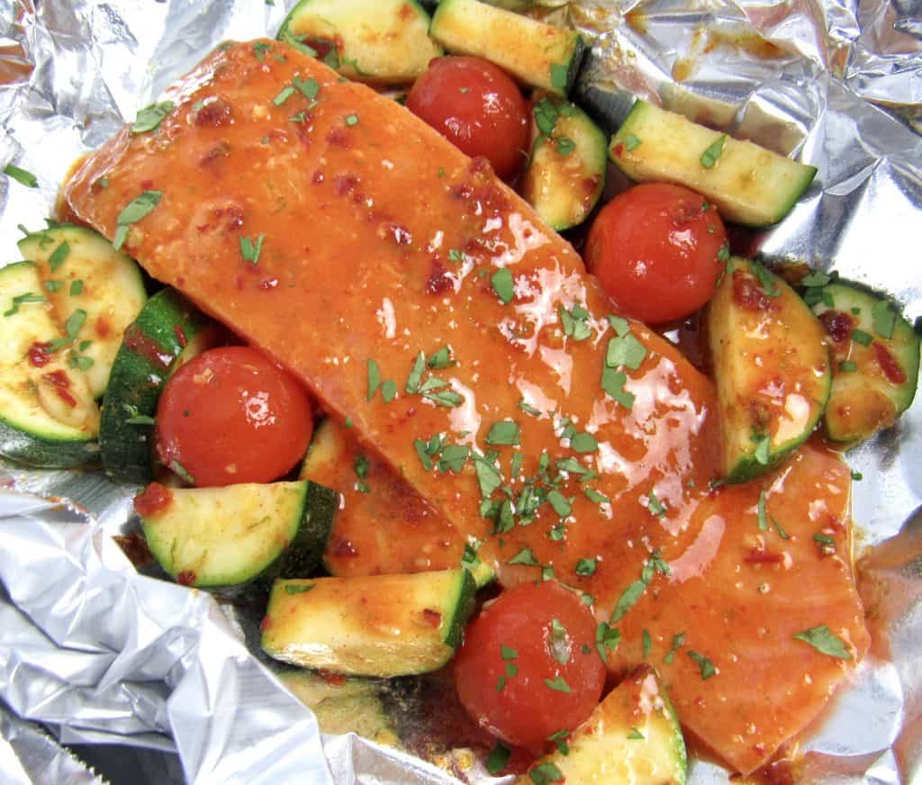 salmon and veggies in foil unbaked