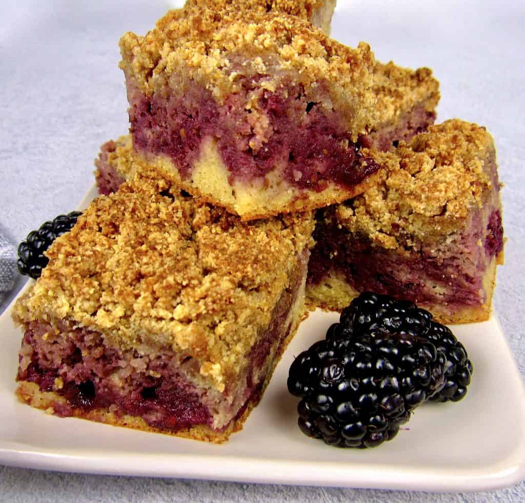 pieces of blackberry coffee cake stacked on plate