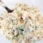 chicken salad in bowl with spoonful