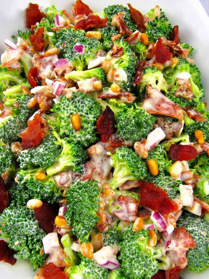 broccoli salad with bacon in white bowl