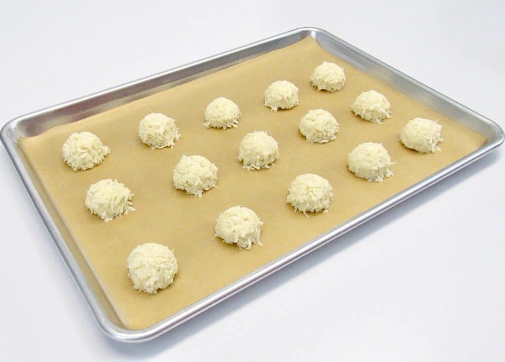 coconut macaroons on baking sheet unbaked