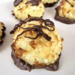 coconut macaroons with chocolate drizzled on top