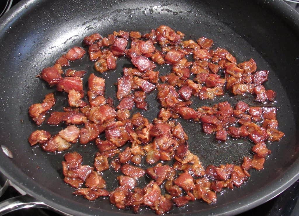 chopped bacon in skillet