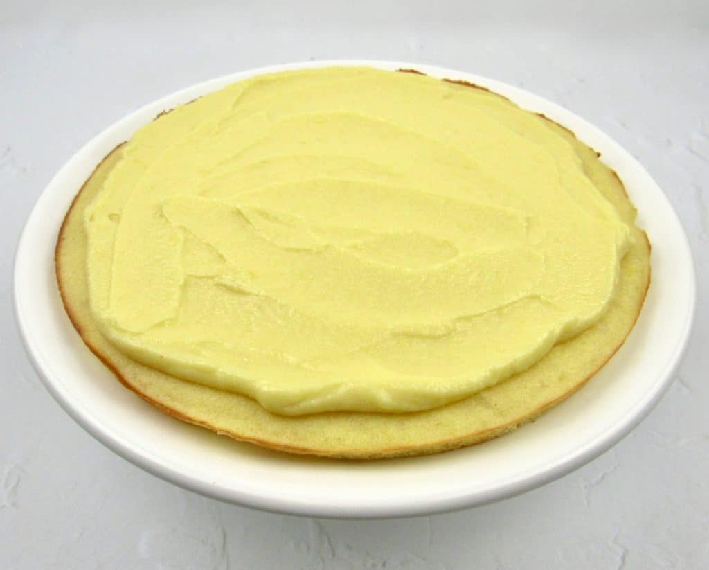 lemon cake layer with frosting on top