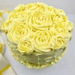 lemon cake with rosettes on top