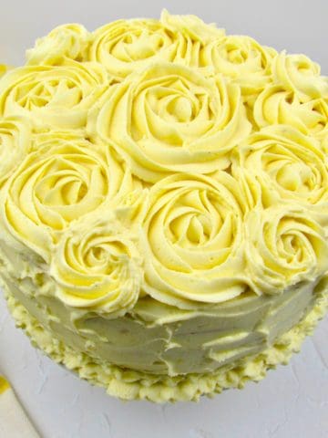 lemon cake with rosettes on top