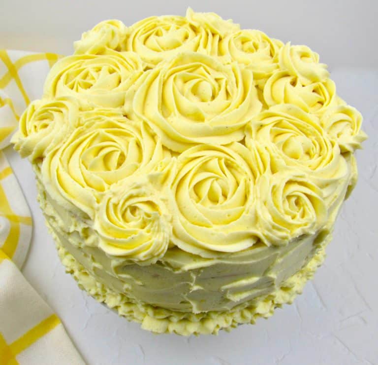 lemon cake with rosettes on top