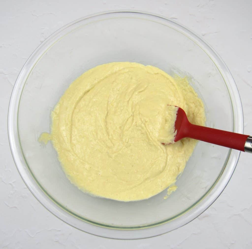 wet and dry lemon cake ingredients in glass bowl