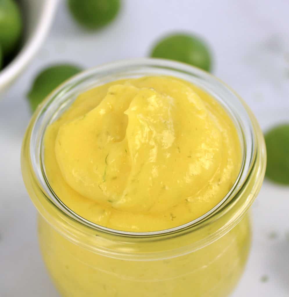 overhead view of Keto Key Lime Curd in glass jar