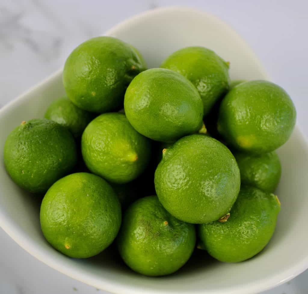 white bowl of key limes