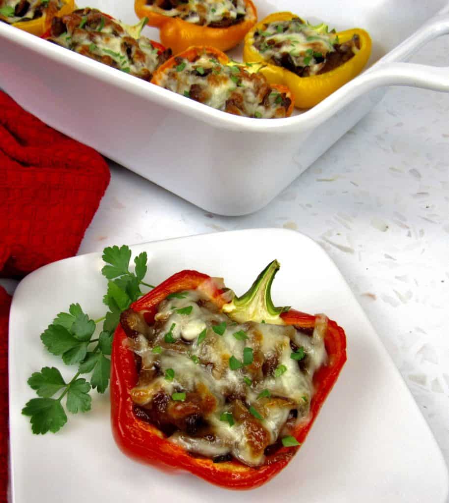 baked stuffed red pepper on white plate