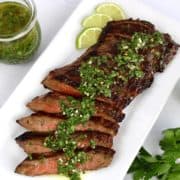 grilled skirt steak sliced with chimichurri sauce on top