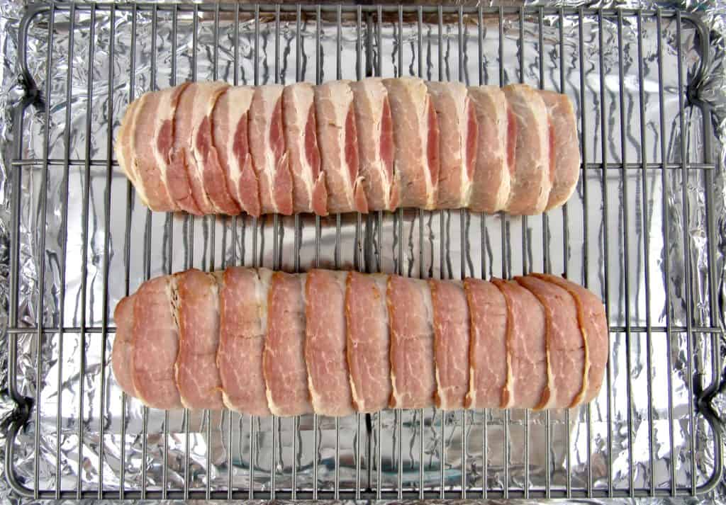 2 pork tenderloins wrapped in bacon on baking rack