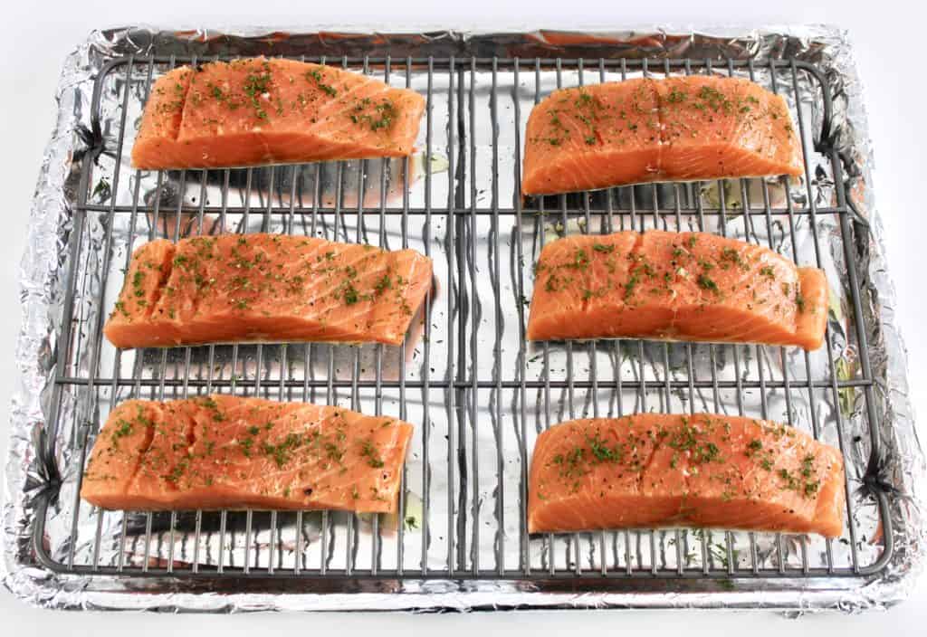 6 pieces raw salmon on baking rack