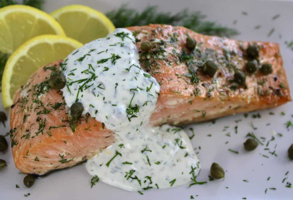 closeup of Baked Salmon with Creamy Dill Sauce on plate