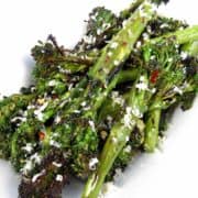 Grilled Broccolini with parmesan cheese on top