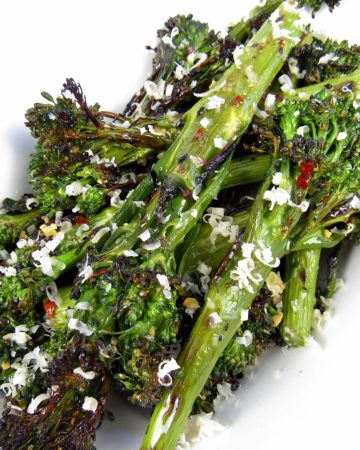 Grilled Broccolini with parmesan cheese on top