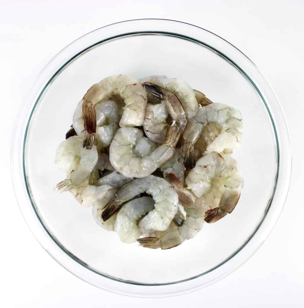 raw shrimp in glass bowl
