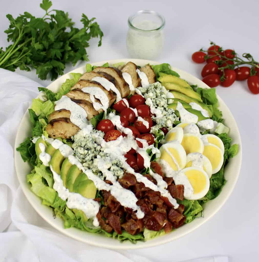 Keto Cobb Salad with Ranch Dressing drizzled on top