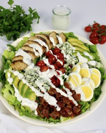 Keto Cobb Salad with Ranch Dressing drizzled on top