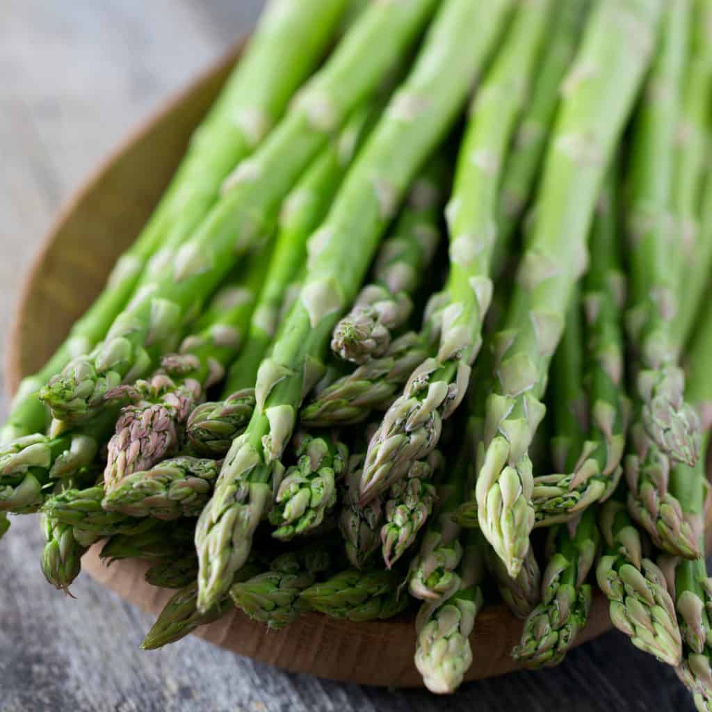 Asparagus in wooden bowl