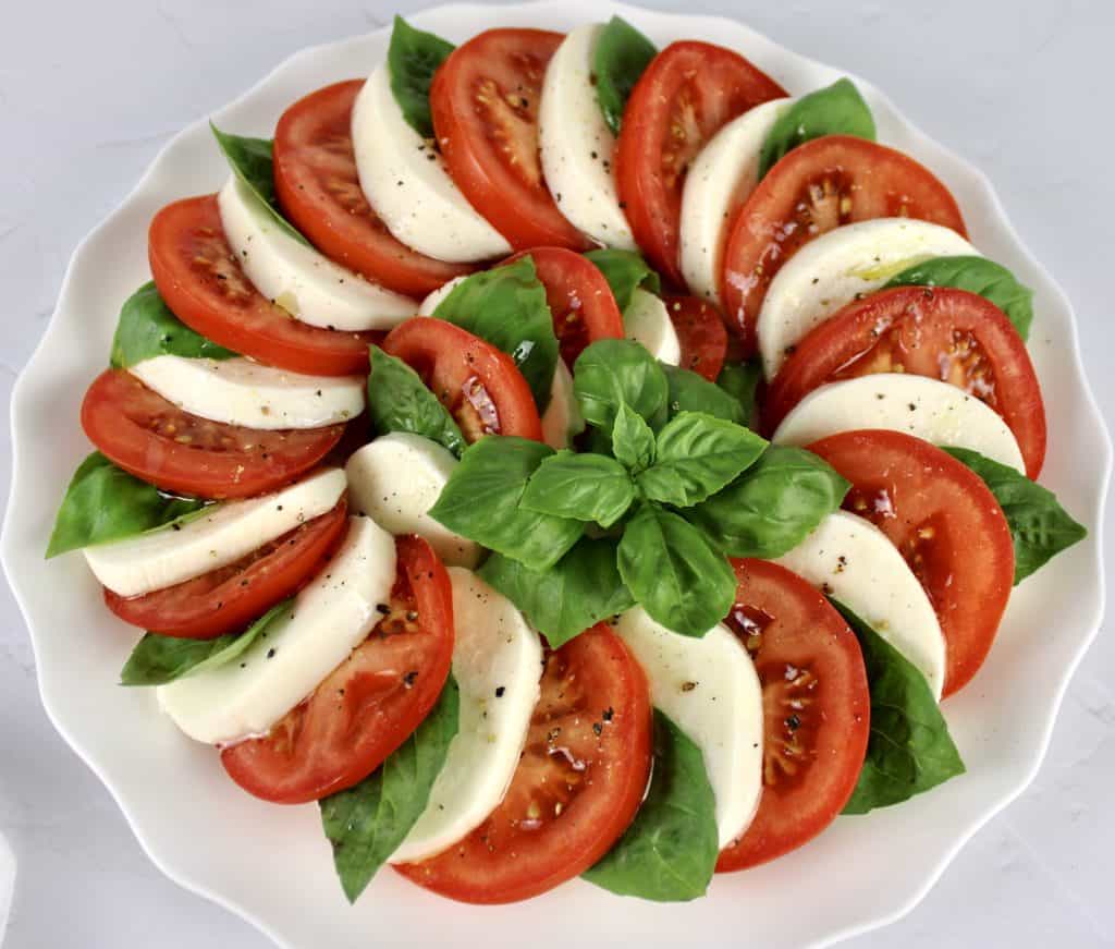 Caprese Salad with olive oil, salt and pepper on top