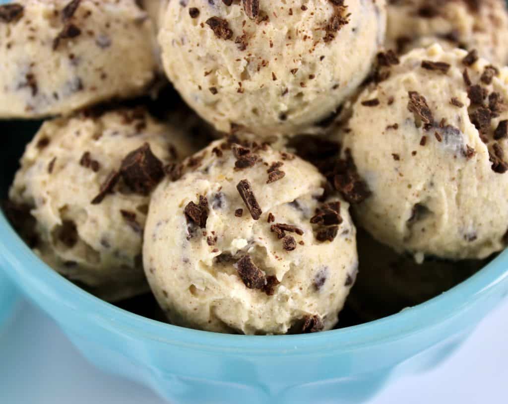 closeup of Cookie Dough Keto Fat Bombs in teal bowl