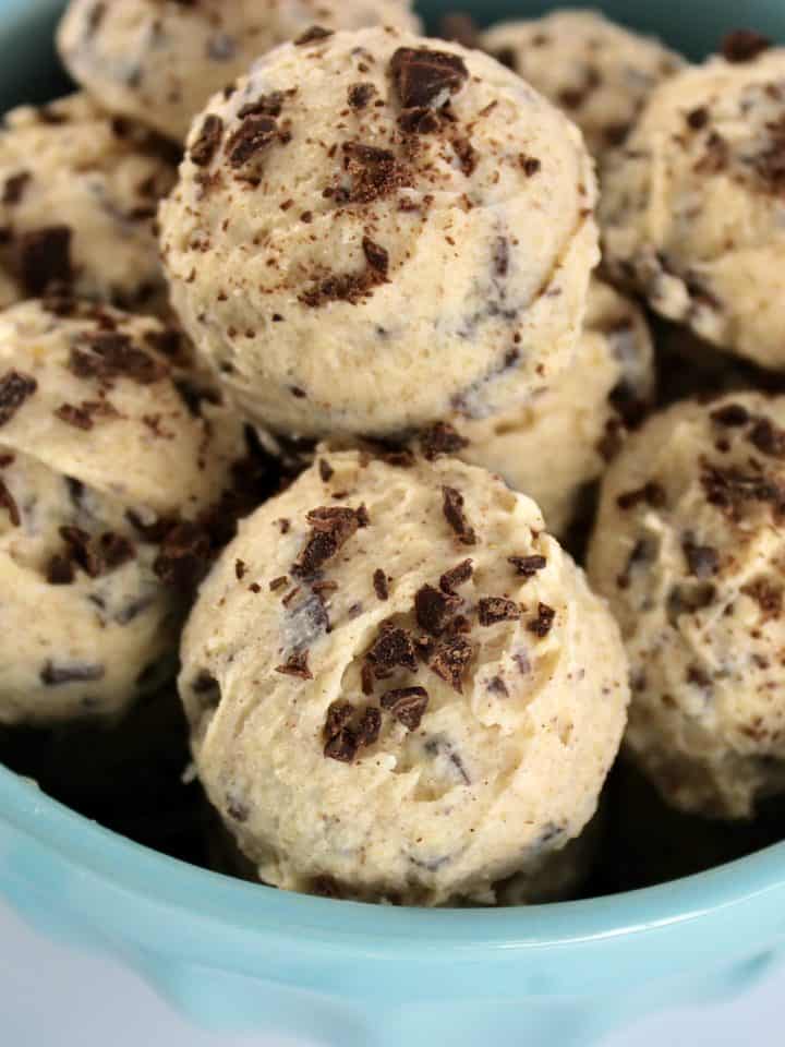 closeup of Cookie Dough Keto Fat Bombs in teal bowl