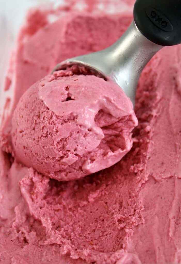 raspberry ice cream with scooper