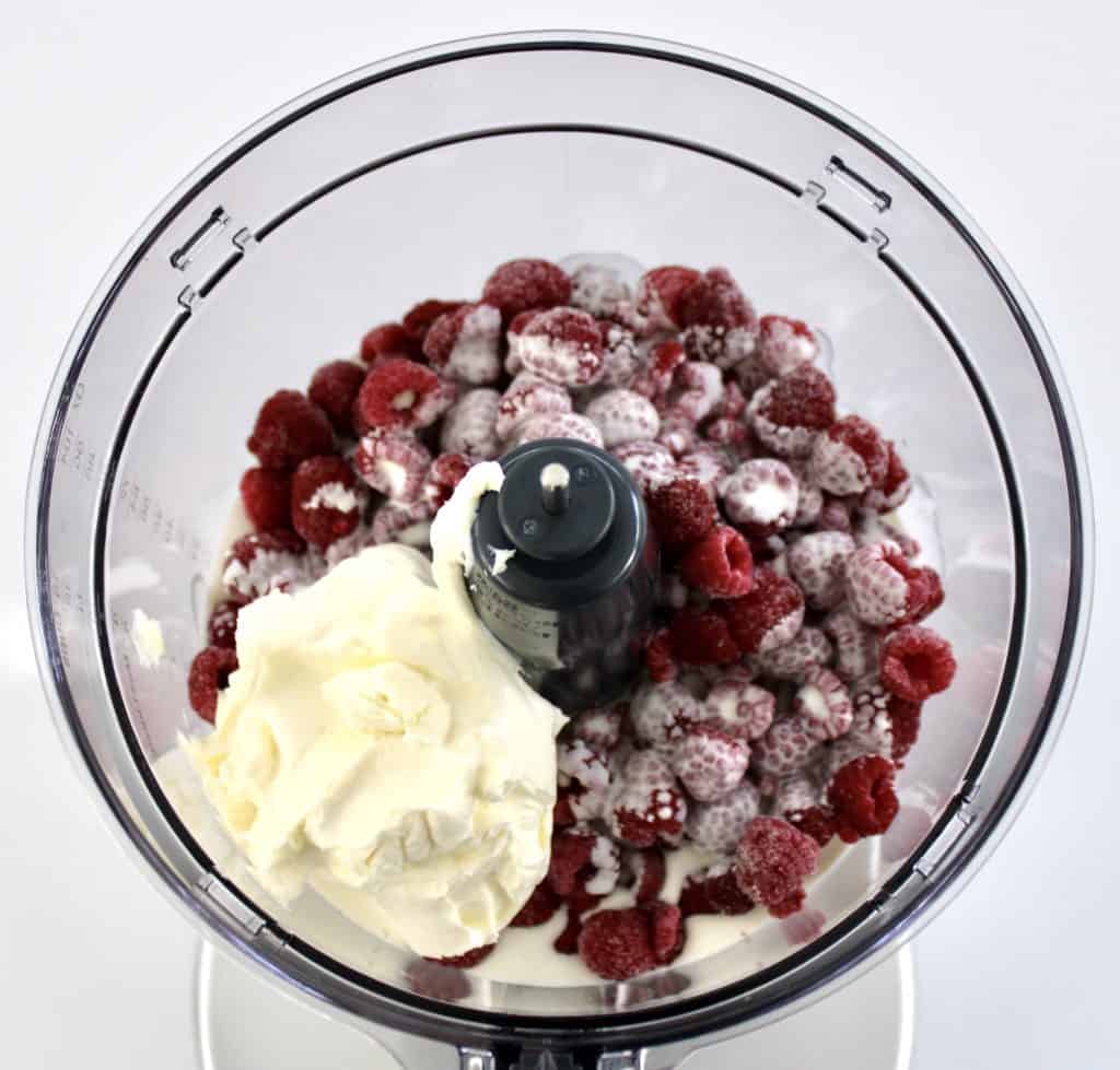 raspberries cream and mascarpone in food processor bowl