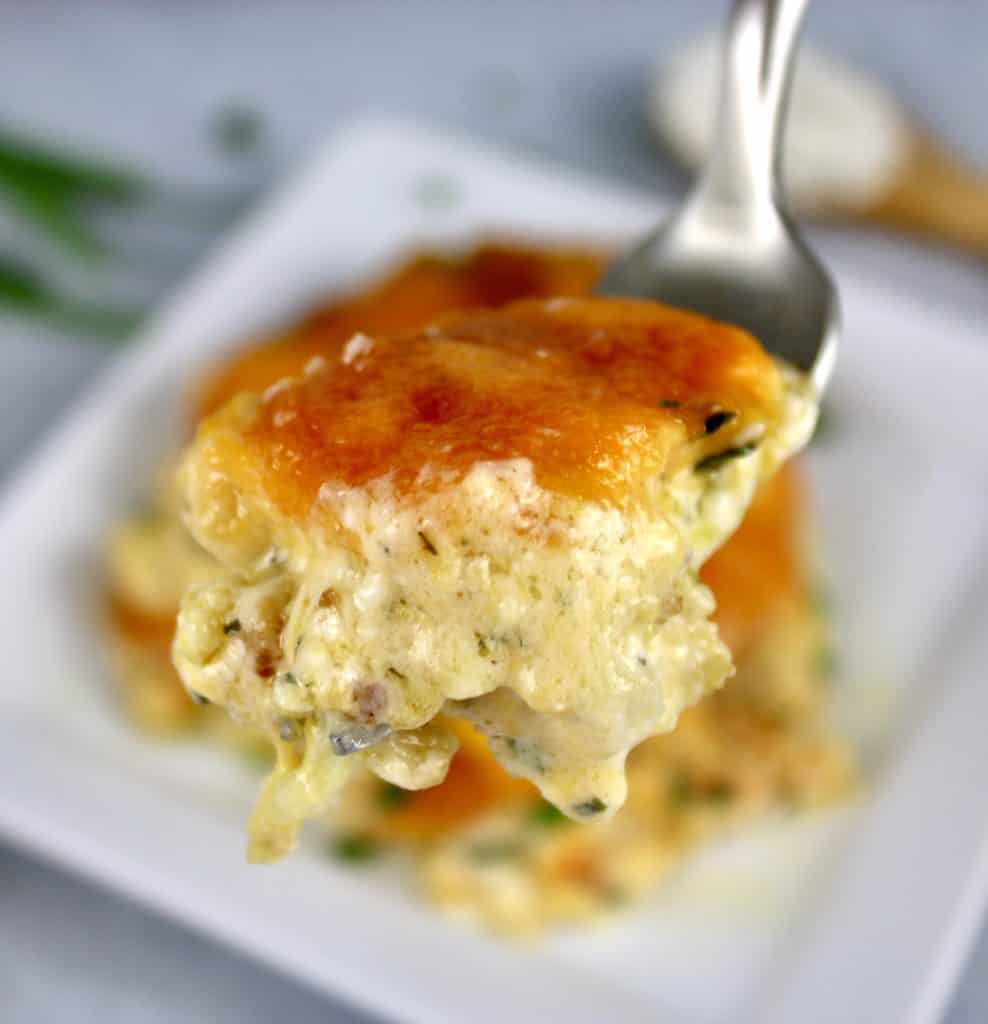 piece of Ranch Roasted Cauliflower Casserole being held up with fork