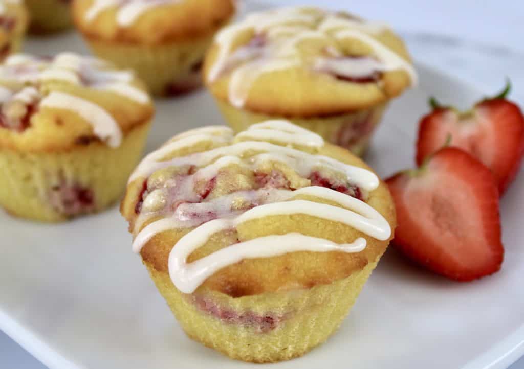 closeup of Keto Strawberry Lemonade Muffin on white plate