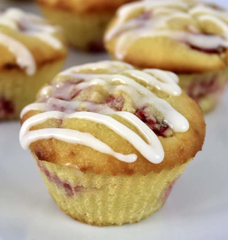 closeup of Keto Strawberry Lemonade Muffin on white plate