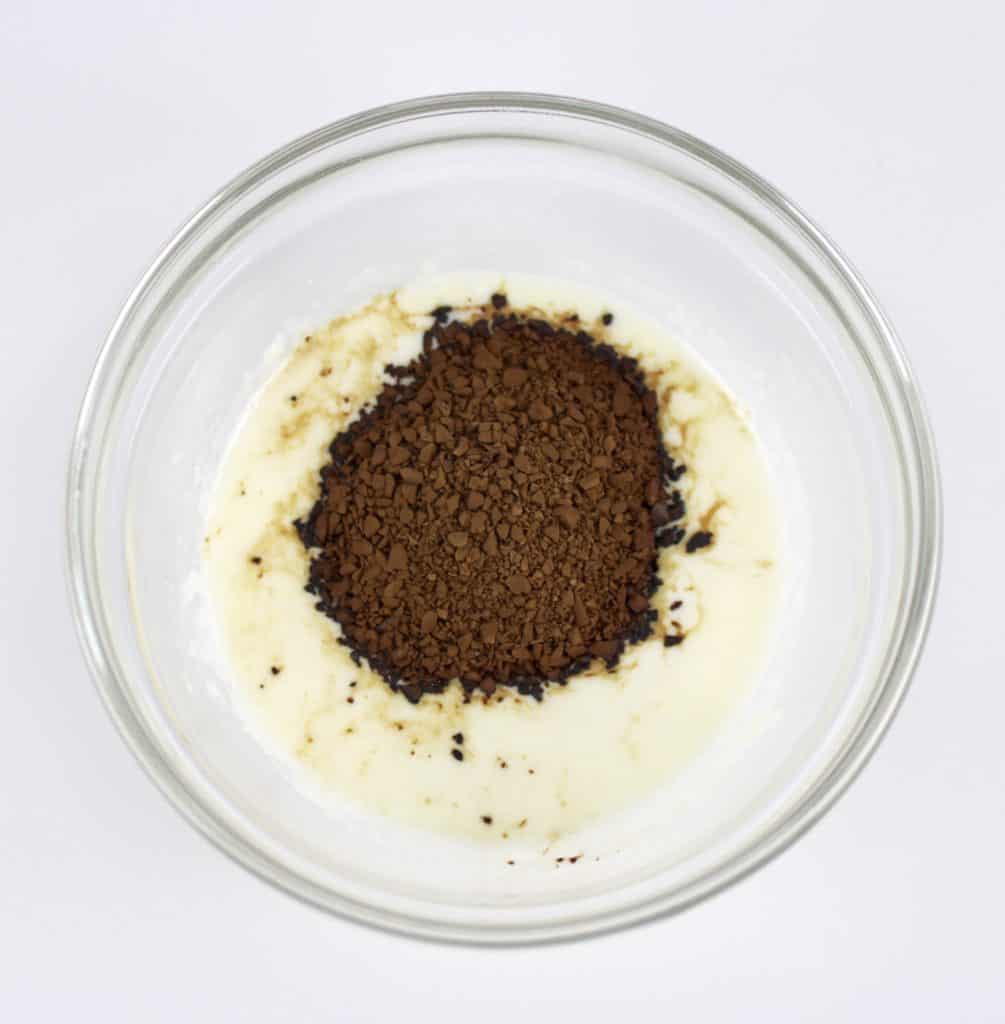 heavy cream with instant coffee granules on top