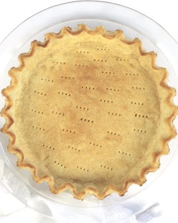 baked pie crust with crimped edges