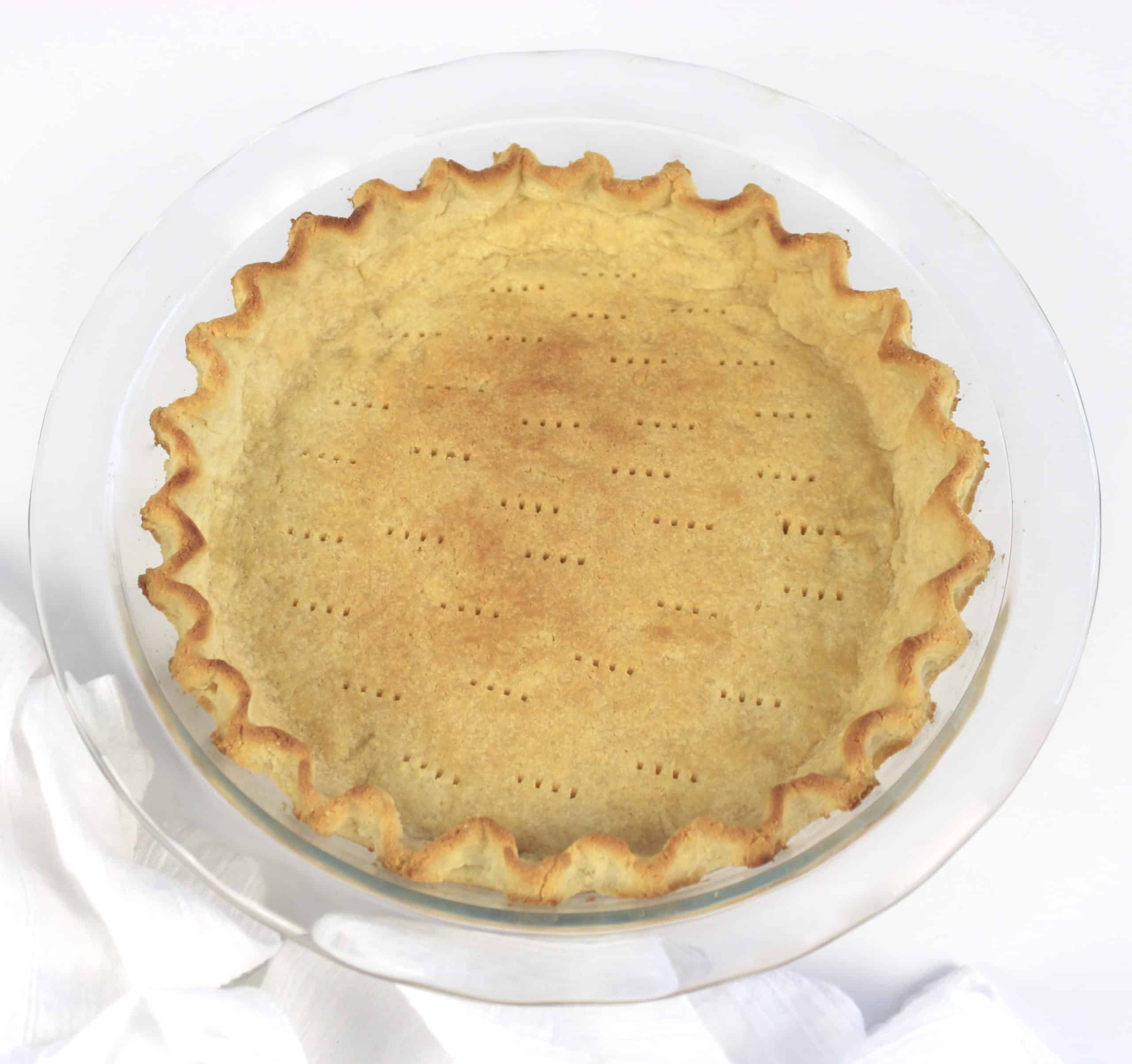 baked pie crust with crimped edges
