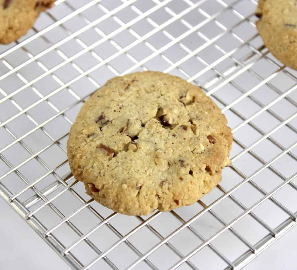 baked butter pecan cookie on cooling rack