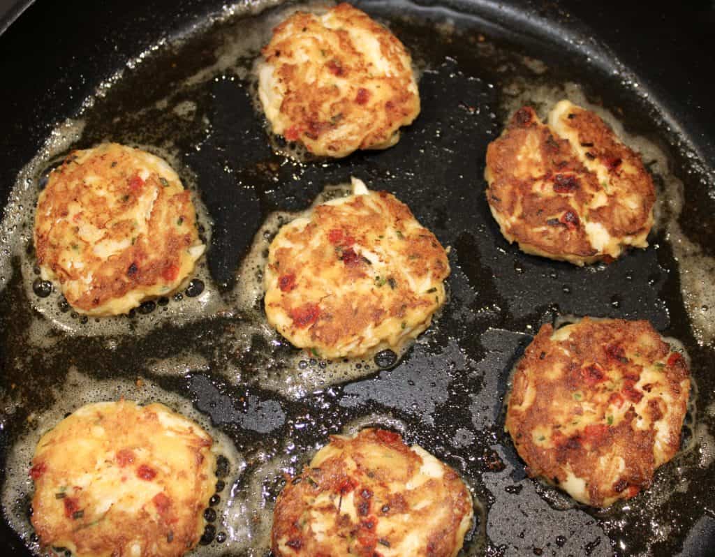 cooked crab cakes in skillet