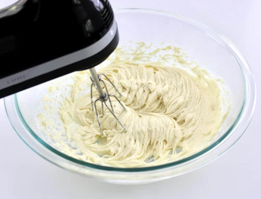 White Chocolate Mousse being mixed in glass bowl