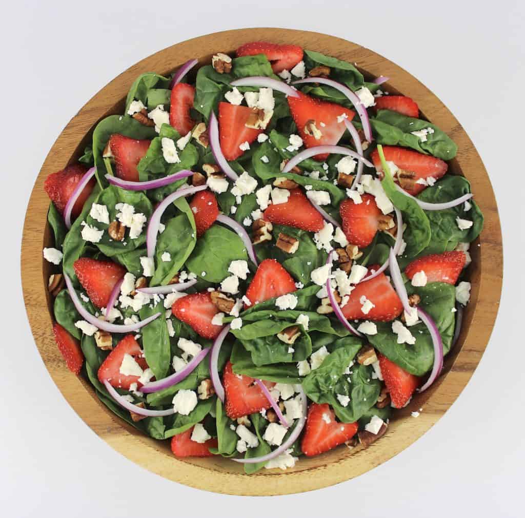 Strawberry Spinach Salad in wooden bowl