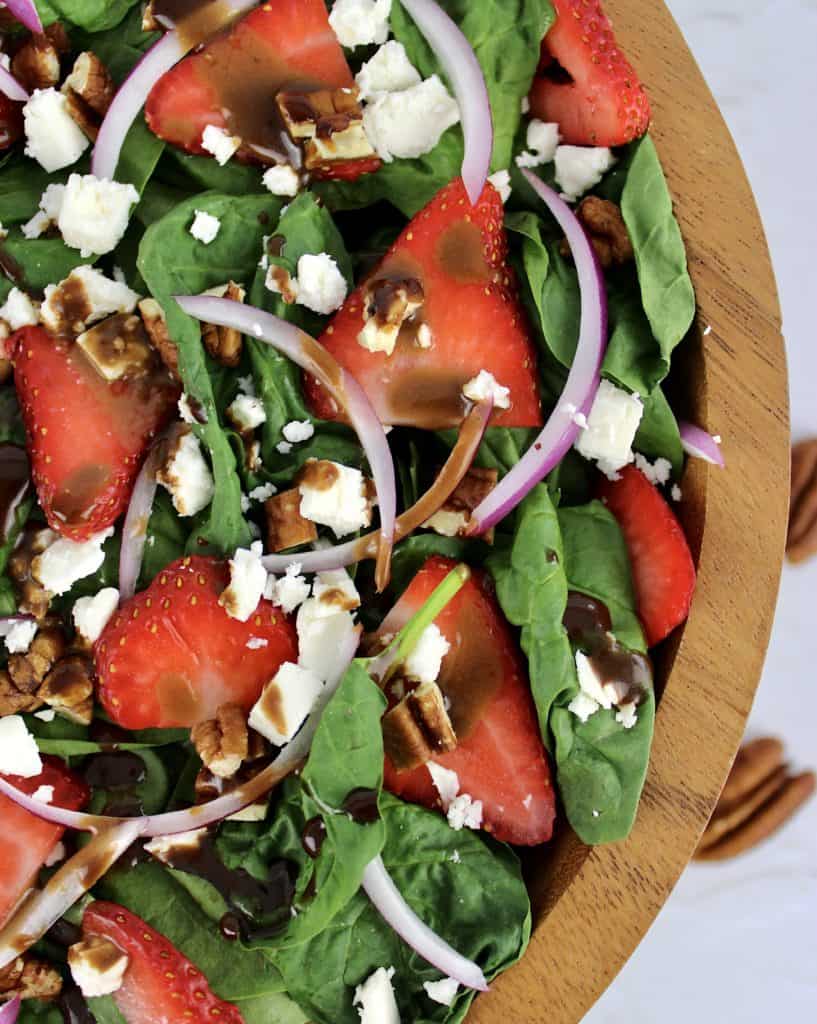 closeup overhead view of Strawberry Spinach Salad with Balsamic Vinaigrette